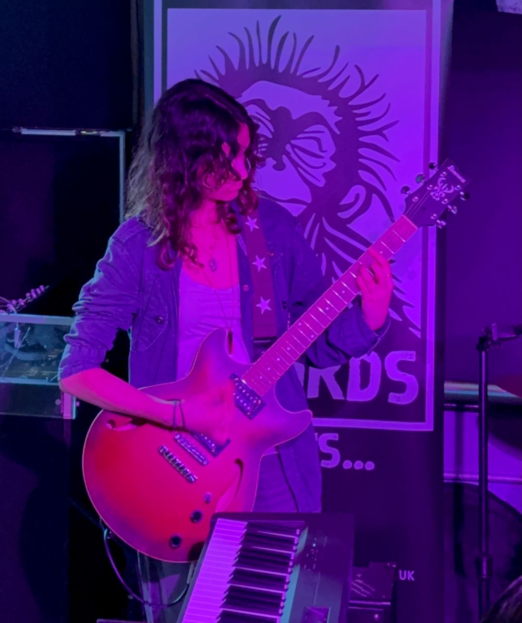 Sho with her guitar
